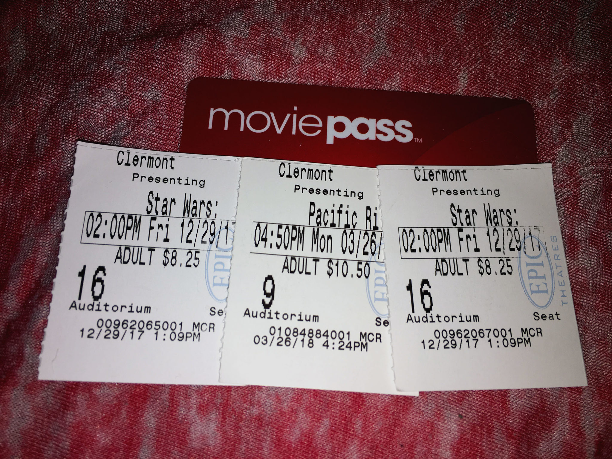 Movie Pass Card and three ticket stubs.