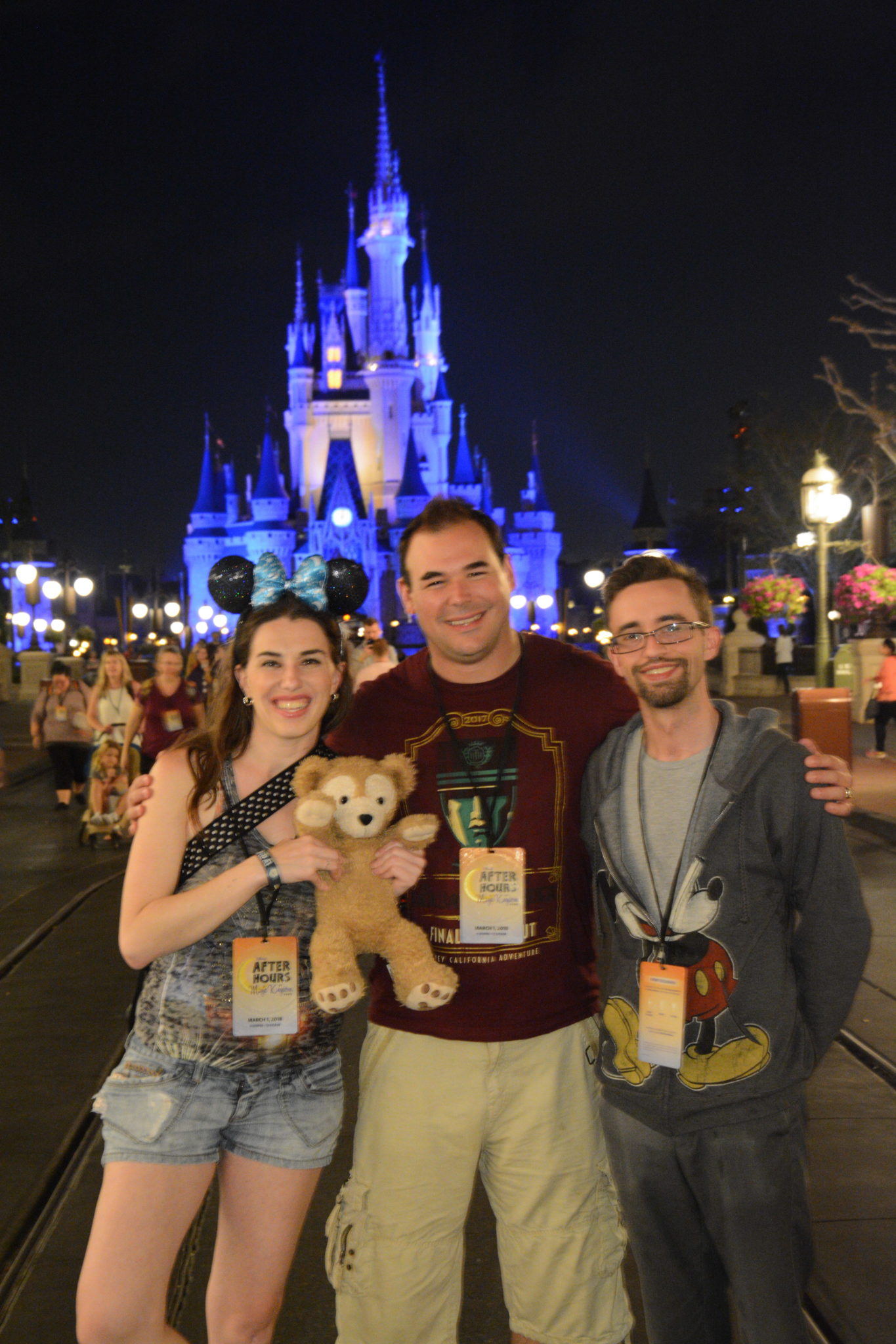 Chelsea, Doug, and Jay in front of Cinderella Castle during the After Hours event.