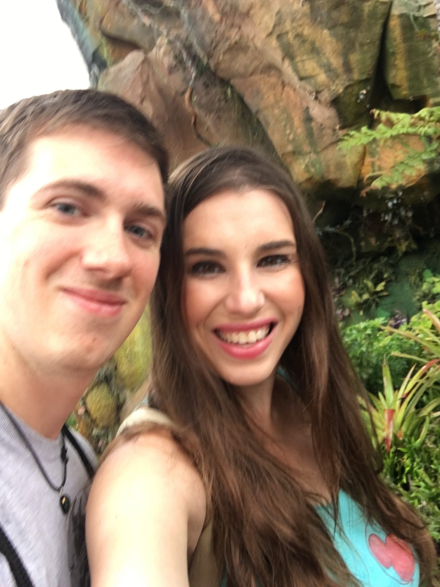 Chelsea and Robby in line for Flight of Passage in the rain.