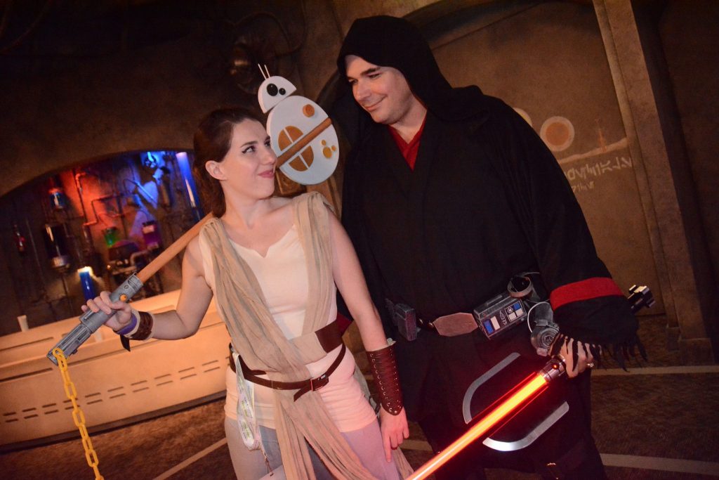 Kingdom Hearts Rey Chelsea and Sith Jay inside Launch Bay during Galactic Nights.