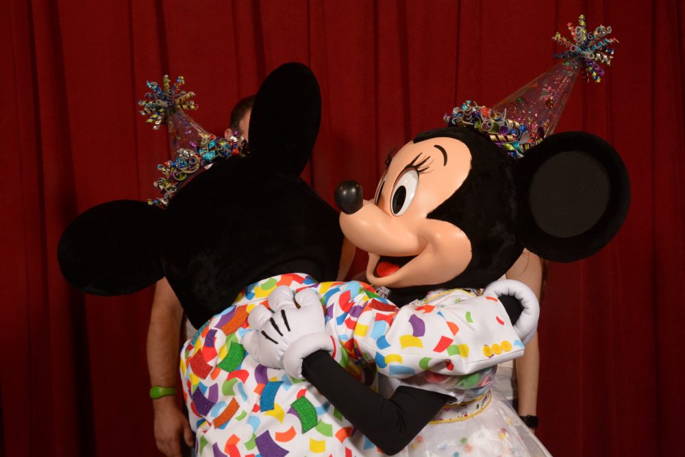 Mickey and Minnie hugging