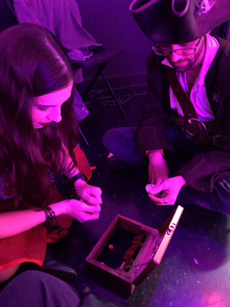 Chelsea and Doug playing shut the box at the Royal Palm Railway