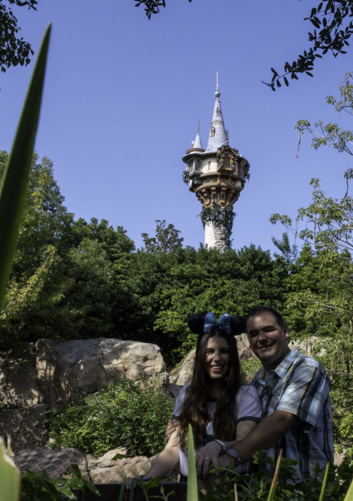 Chelsea and Jay in front of Rapunzel's Tower.